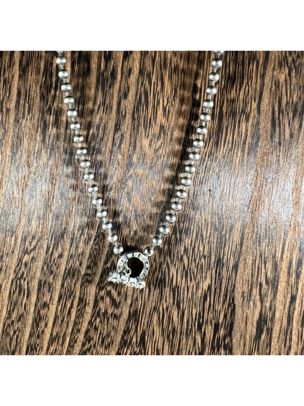 Gun Metal Beaded Necklace With Rhinestone Circle Pendant Embellished With Sparkl